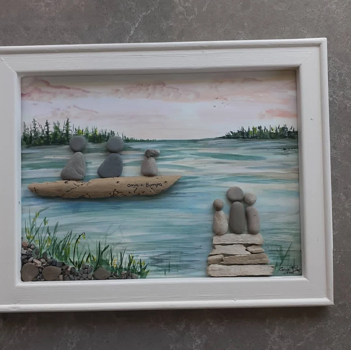 Custom pebble art family scene by Creative Connie